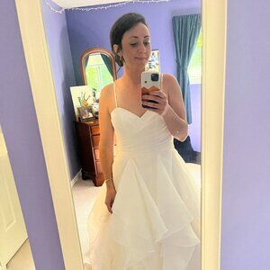 Never used Essense of Australia Ivory Wedding Gown Size 12.  A-line sweetheart